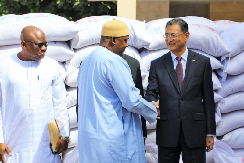 President Barrow receives over 40,000 bags of rice from China Aid
